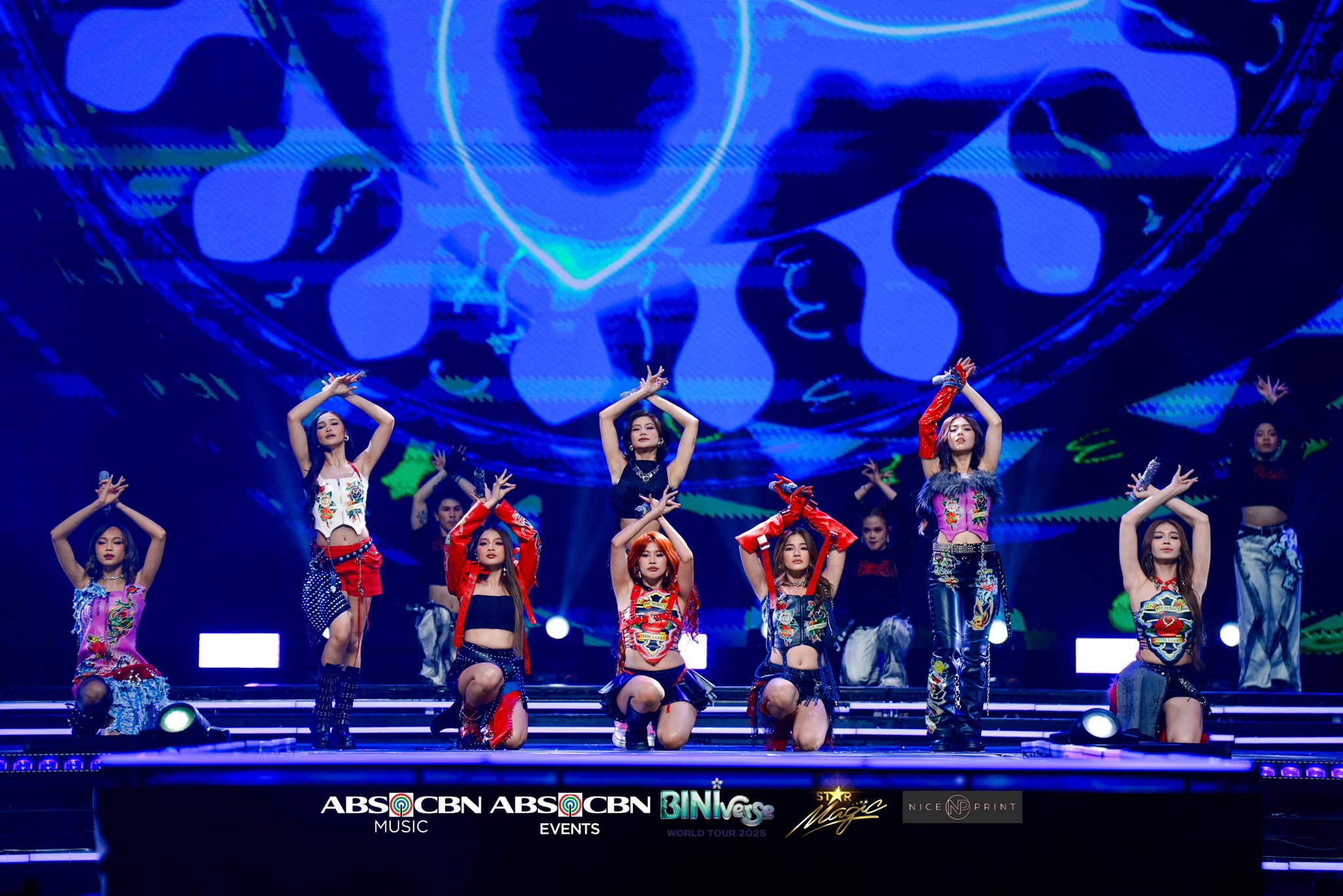 BINI performing on stage in Philippine Arena