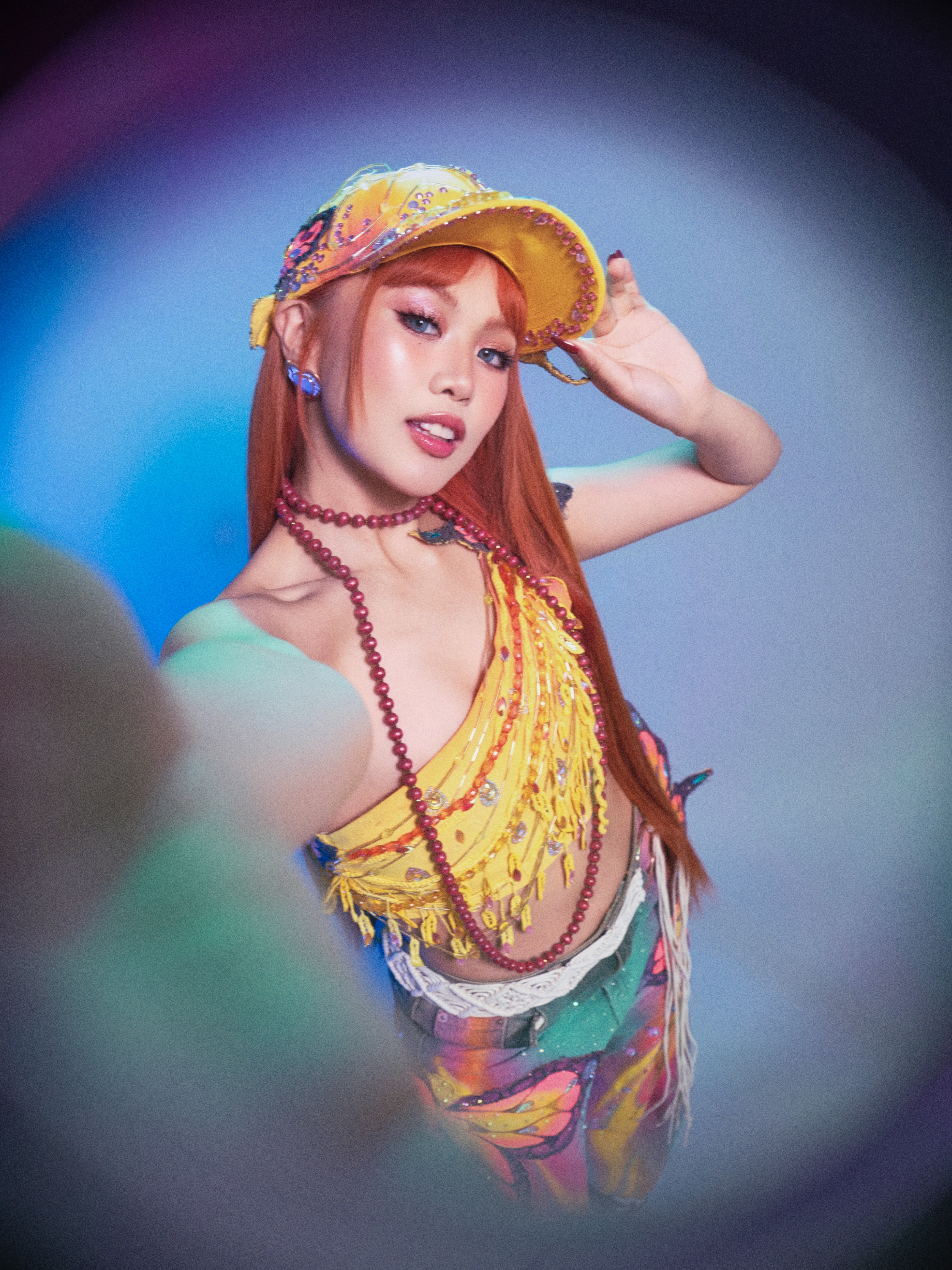 BINI Maloi in pink and yellow outfit